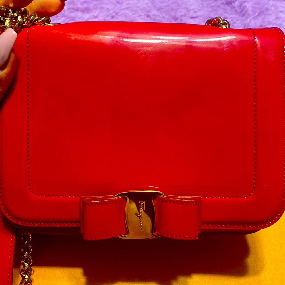 Red Salvatore Ferragamo cross body purse